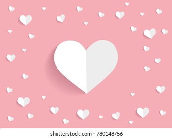 heart shape paper folded in soft pink background 