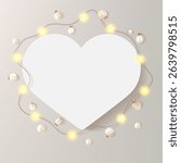 Heart shape picture frame. White card with wreath of shiny star light bulbs. Love message, birthday congrats, soft beige festive luxury bg. Realistic photo mockup, decorated with Christmas garland