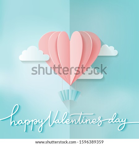 Heart shape Pink hot air balloon flying. Love in paper cut style. Origami heart and clouds. Happy Valentine's day hand lettering. Romantic Holidays. 14 February