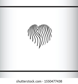Heart shape with zebras striped fur pattern. I love zebra. I love safari. Fashion logo concept. Logo design template.