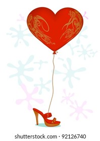 heart shaped balloon tied to a shoe