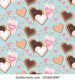 Heart shaped cookies pattern. Blue background for Valentines Day.