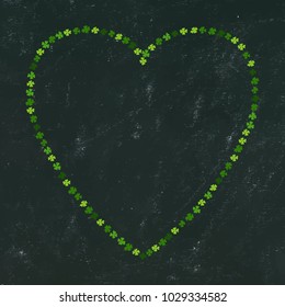 Heart Shaped Frame of Green Clovers on Black Board Background. St Patricks Day Vector Illustration Hand Drawn. Savoyar Doodle Style.