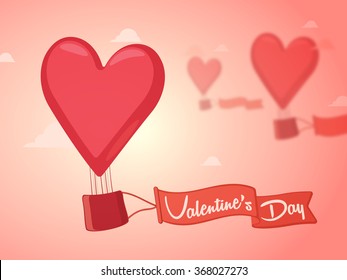 Heart shaped hor air balloon with ribbon flying on glossy cloudy background for Happy Valentine's Day celebration.
