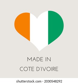 Heart shaped label with Ivory Coast flag. Made in Cote D'ivoire Sticker. Factory, manufacturing and production country concept. Vector stock illustration