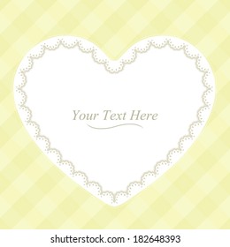 A heart shaped lace frame on a soft yellow plaid background. Eps 10 Vector.