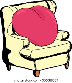 Heart shaped object sitting on a sofa chair