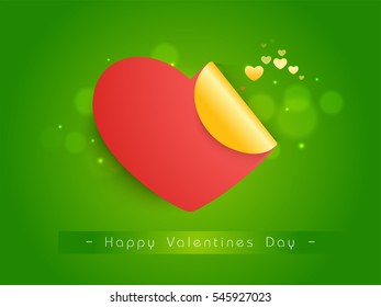 Heart shaped sticky design on shiny green background for Happy Valentine's Day Celebration.