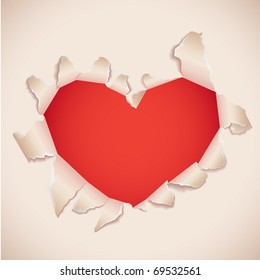 Heart shaped torn paper with red copy space . Valentine's card.