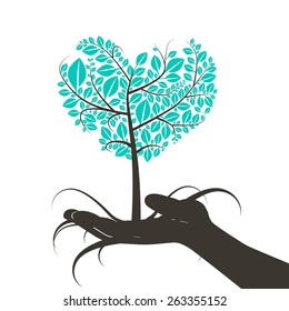 Heart Shaped Tree in Human Hand Silhouette