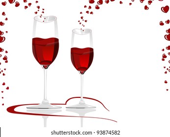 Heart shaped wine glasses filled with love wine.
