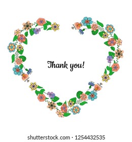 heart shaped wreath made of flowers isolated on white background