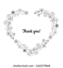 heart shaped wreath made of flowers isolated on white background