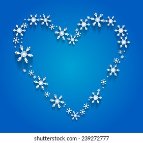 Heart of the Snowflakes on blue background