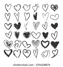 Heart symbol set sketch engraving vector illustration. Romantic love lovesickness symbol. T-shirt apparel print design. Scratch board imitation. Black and white hand drawn image.
