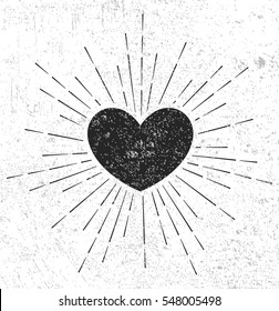 Heart symbol with sunburst on grunge background 