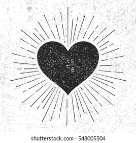 Heart symbol with sunburst on grunge background 