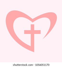 A heart that have a cross sign in it. Religion concept.