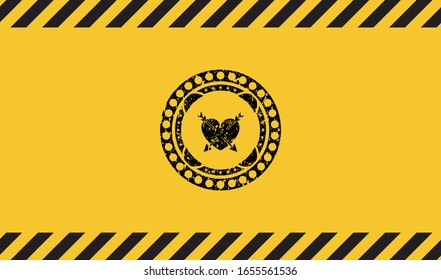 heart with two arrows icon black grunge emblem with yellow background. Vector Illustration. Detailed.