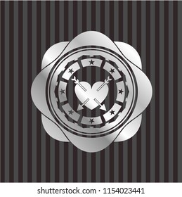 heart with two arrows icon inside silver emblem or badge