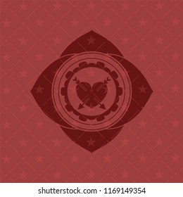heart with two arrows icon inside red emblem