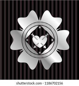 heart with two arrows icon inside silver emblem