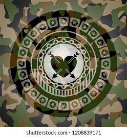 heart with two arrows icon inside camouflage emblem