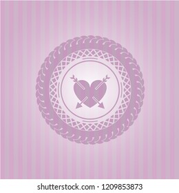 heart with two arrows icon inside pink emblem