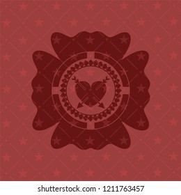 heart with two arrows icon inside red emblem