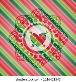 heart with two arrows icon inside christmas badge.