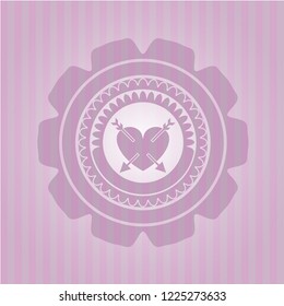 heart with two arrows icon inside badge with pink background