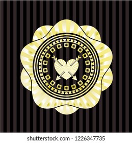 heart with two arrows icon inside gold emblem