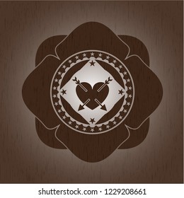 heart with two arrows icon inside wood emblem. Vintage.