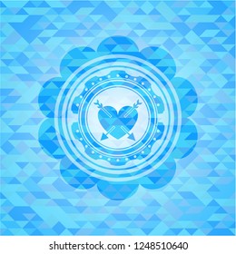 heart with two arrows icon inside sky blue emblem. Mosaic background