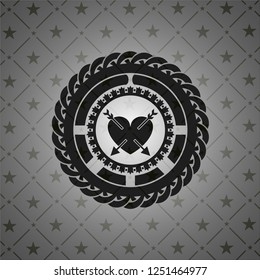heart with two arrows icon inside black badge