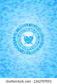 heart with two arrows icon inside light blue mosaic emblem