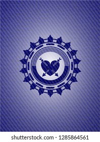 heart with two arrows icon inside emblem with jean background