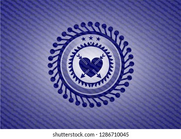 heart with two arrows icon inside emblem with jean high quality background