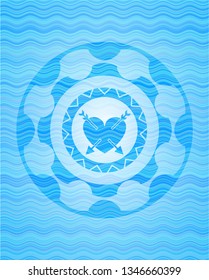 heart with two arrows icon inside water wavec oncept emblem.