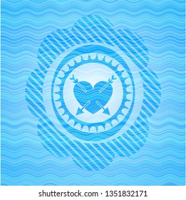 heart with two arrows icon inside water wave badge background.