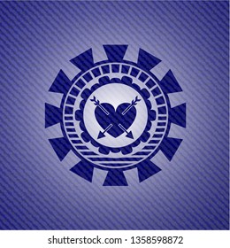 heart with two arrows icon inside jean background