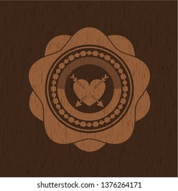 heart with two arrows icon inside wood emblem. Retro