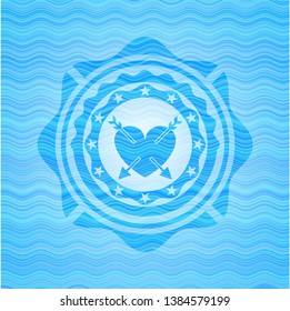 heart with two arrows icon inside water emblem.
