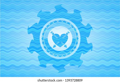 heart with two arrows icon inside water representation badge.