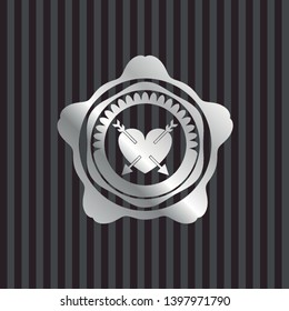 heart with two arrows icon inside silvery shiny emblem