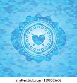 heart with two arrows icon inside sky blue emblem with triangle mosaic background