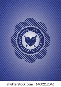 heart with two arrows icon inside emblem with jean background