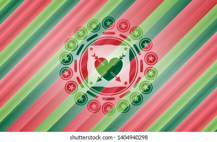 heart with two arrows icon inside christmas badge.