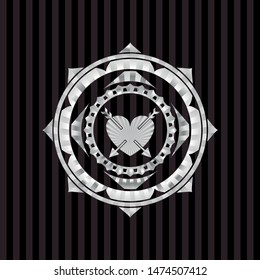 heart with two arrows icon inside silver badge