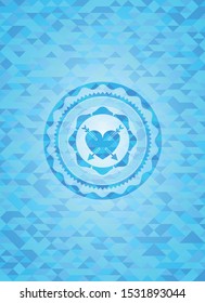 heart with two arrows icon inside realistic light blue mosaic emblem